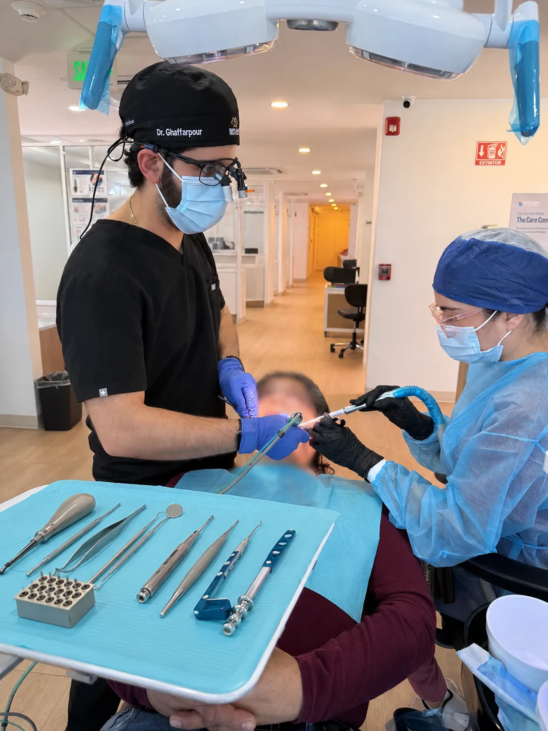 Dr. Soroush Ghaffarpour performing oral surgery at Kentfield Dental